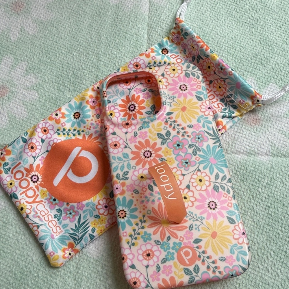 Loopy 14 Pro Max.  Floral Phone Case with Pouch